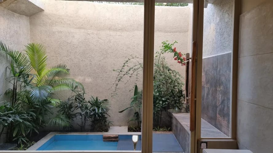 A private plunge pool open to the sky in a Junior Suite