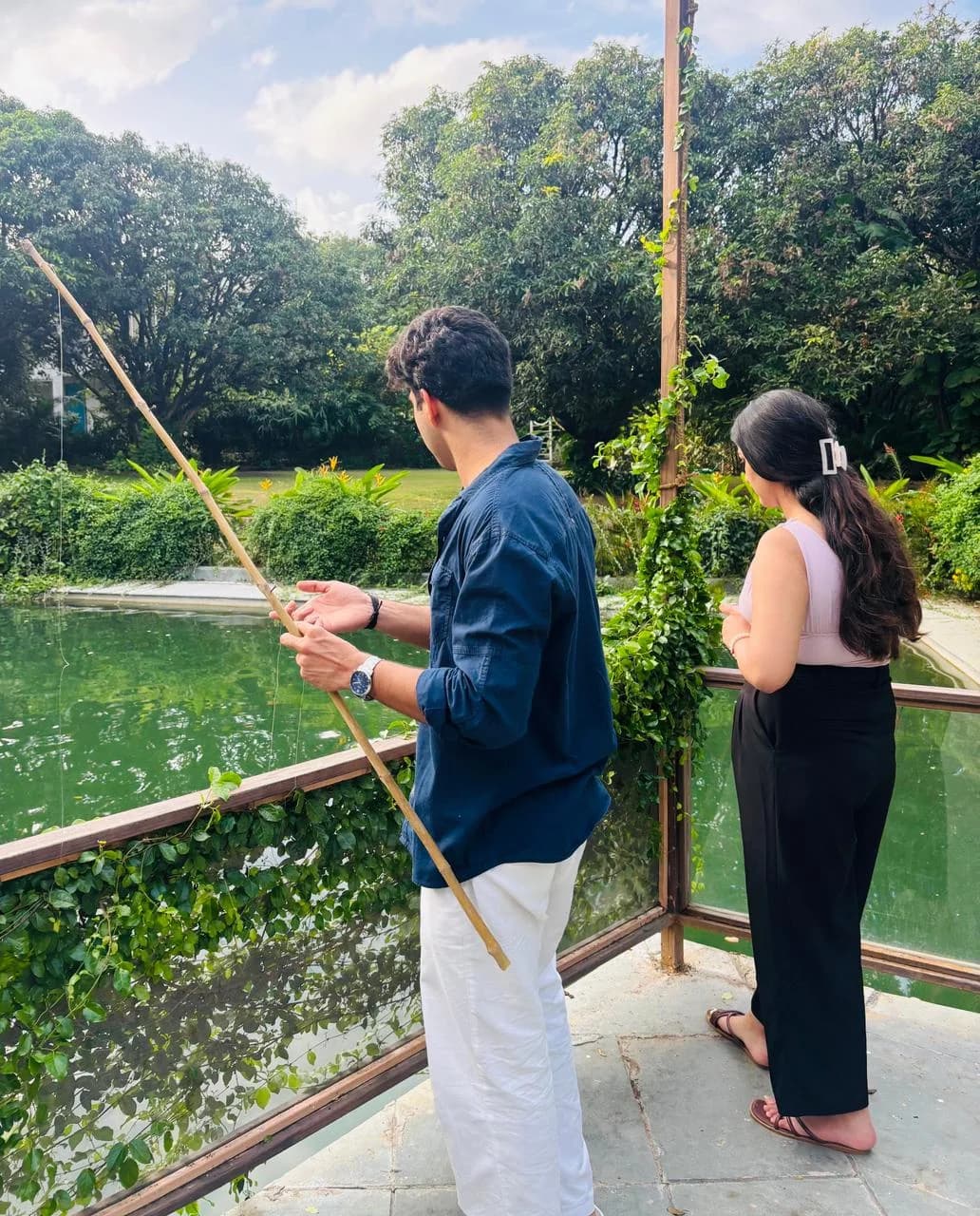 Fishing from the lily-pond deck at Giovanni Village